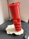 Symbolischer „Dübel“ mit integrierter Mini‑Vase